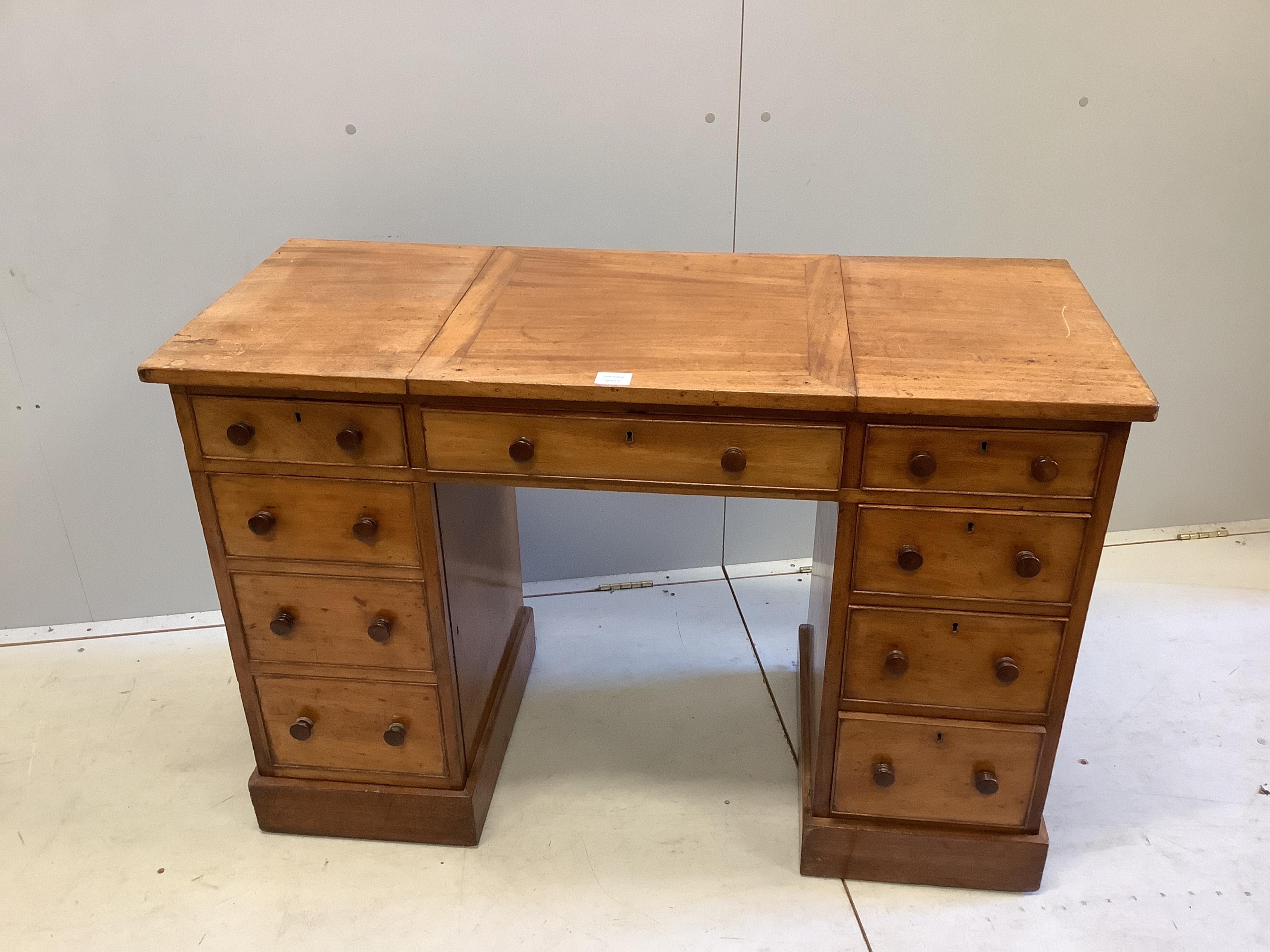 A Victorian pale mahogany metamorphic kneehole desk by Miles & Edwards, 134 Oxford Street, London, width 114cm, depth 48cm, height 76cm. Condition - fair to good.